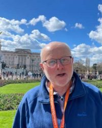 Philip Scott outside Buckingham Palace on his Royal London Tour