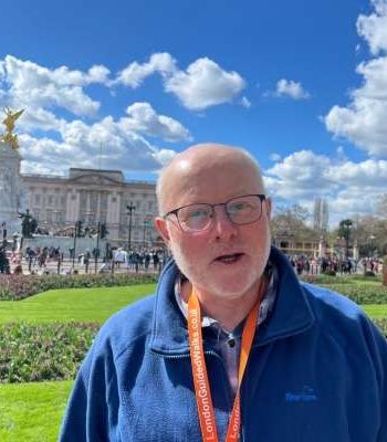 Philip Scott outside Buckingham Palace on his Royal London Tour