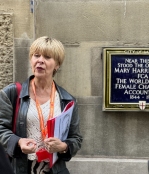 Jenny Funnell at the plaque of Mary Harris Smith on her Pioneering Women in the City walking tour