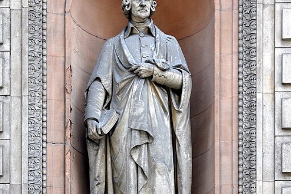 Statue of Smith built in 1867–1870 at the old headquarters of the University of London, 6 Burlington Gardens_6_Burlington_Gardens_facade_Smith